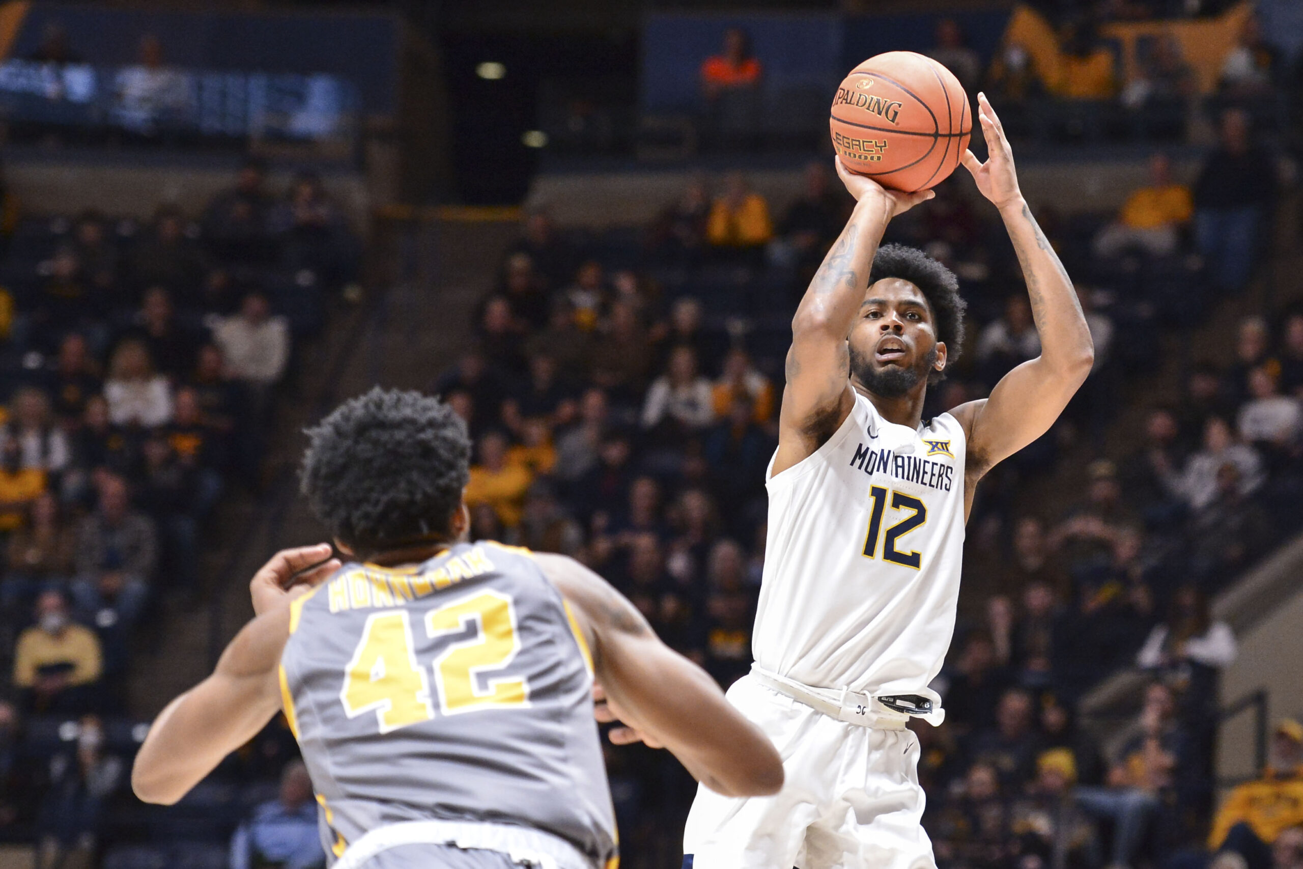 Taz Sherman, Sean McNeil lead West Virginia over Kent State 63-50